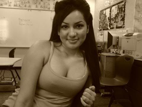 onto Oxnard tightly as he moved down to her breasts running his tongue