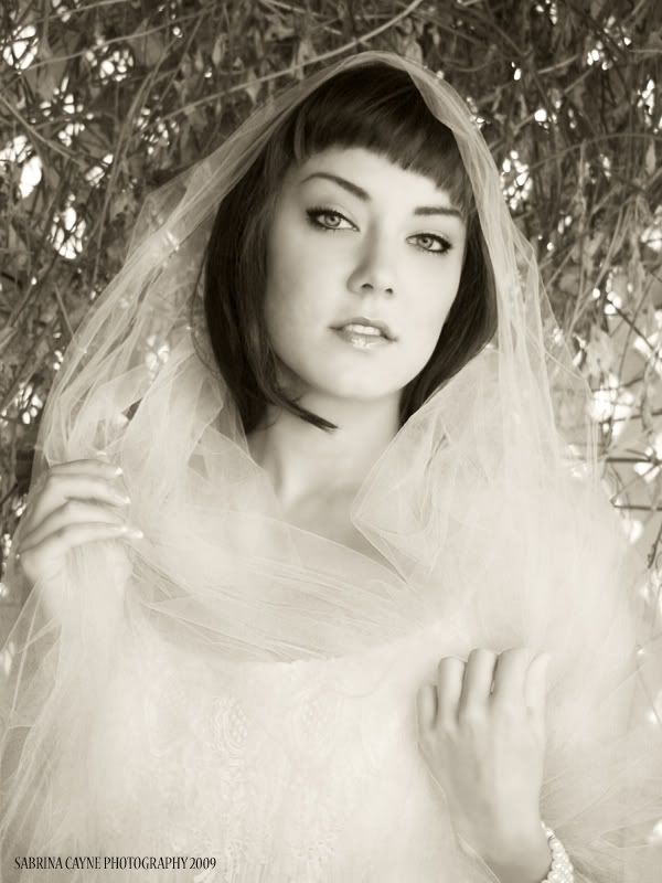 http://i167.photobucket.com/albums/u130/silverjade_photos/Nicoleedits011.jpg