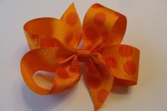 Orange polka dot bow